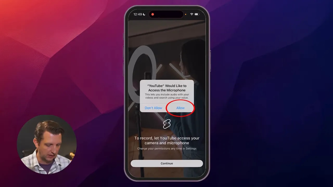 iPhone system dialog asking to allow YouTube access to microphone